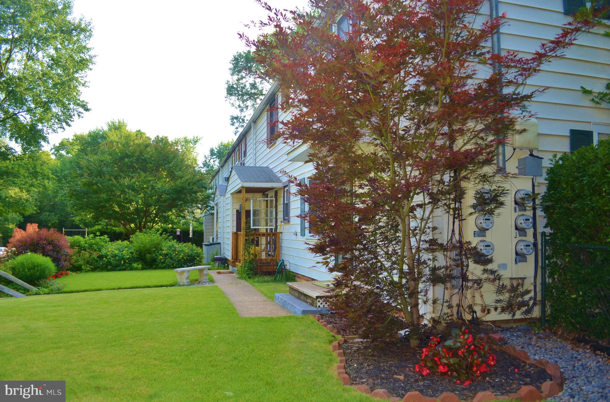 18 Ridge Road, Unit E Greenbelt, MD 20770 - Photo 11 of 15 Front Yard - Side View