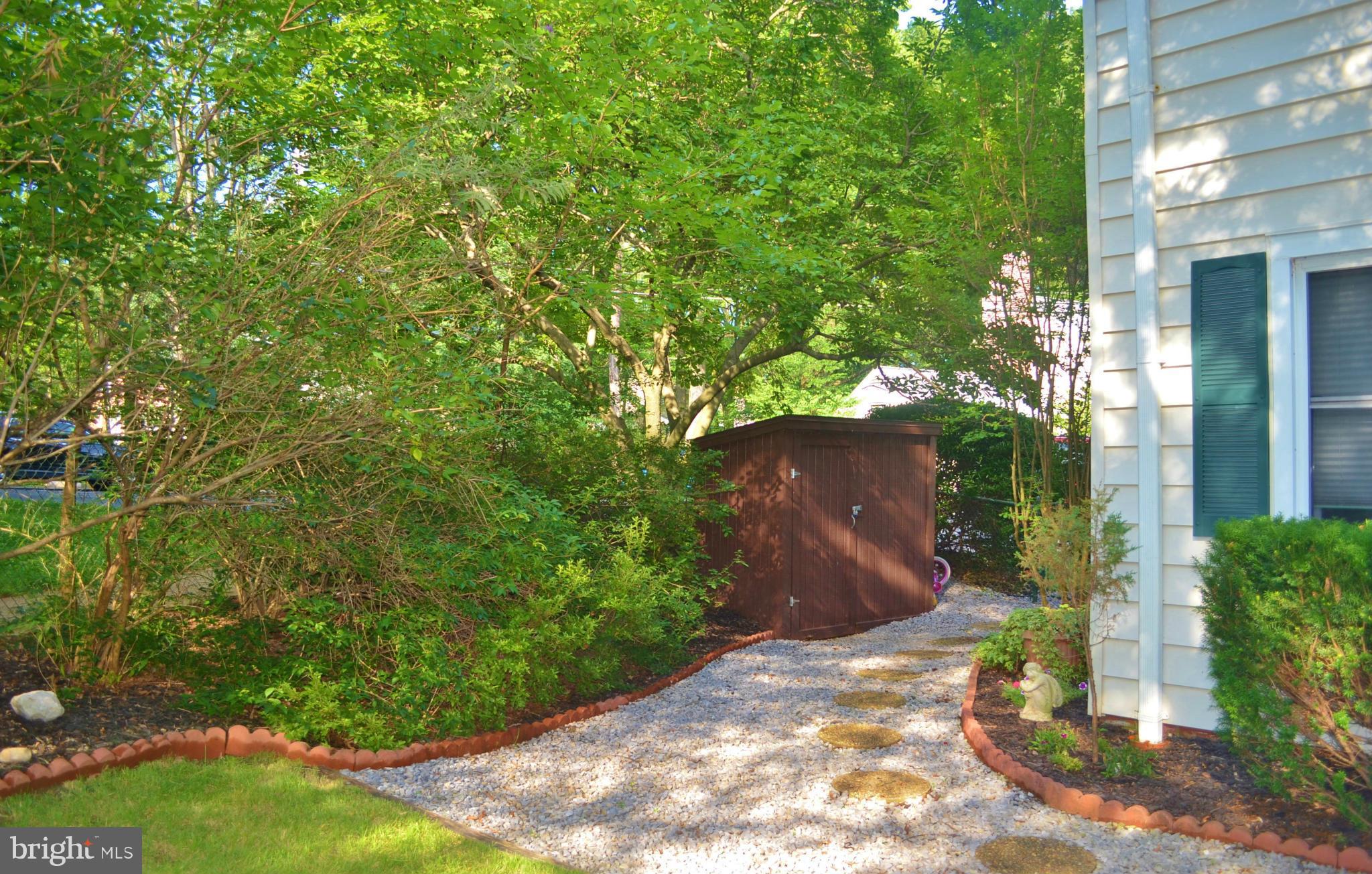 18 Ridge Road, Unit E Greenbelt, MD 20770 - Photo 8 of 15 Side Yard Walkway