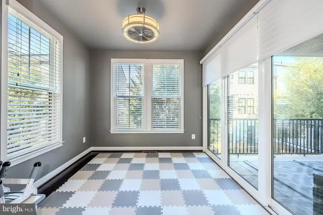 a view of a room with a large window