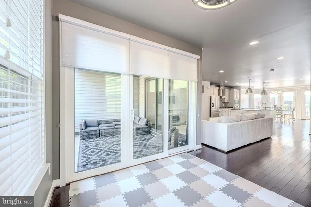 a large living room with a large window