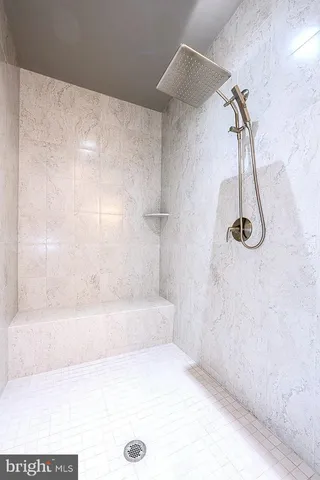 a bathroom with a bath tub