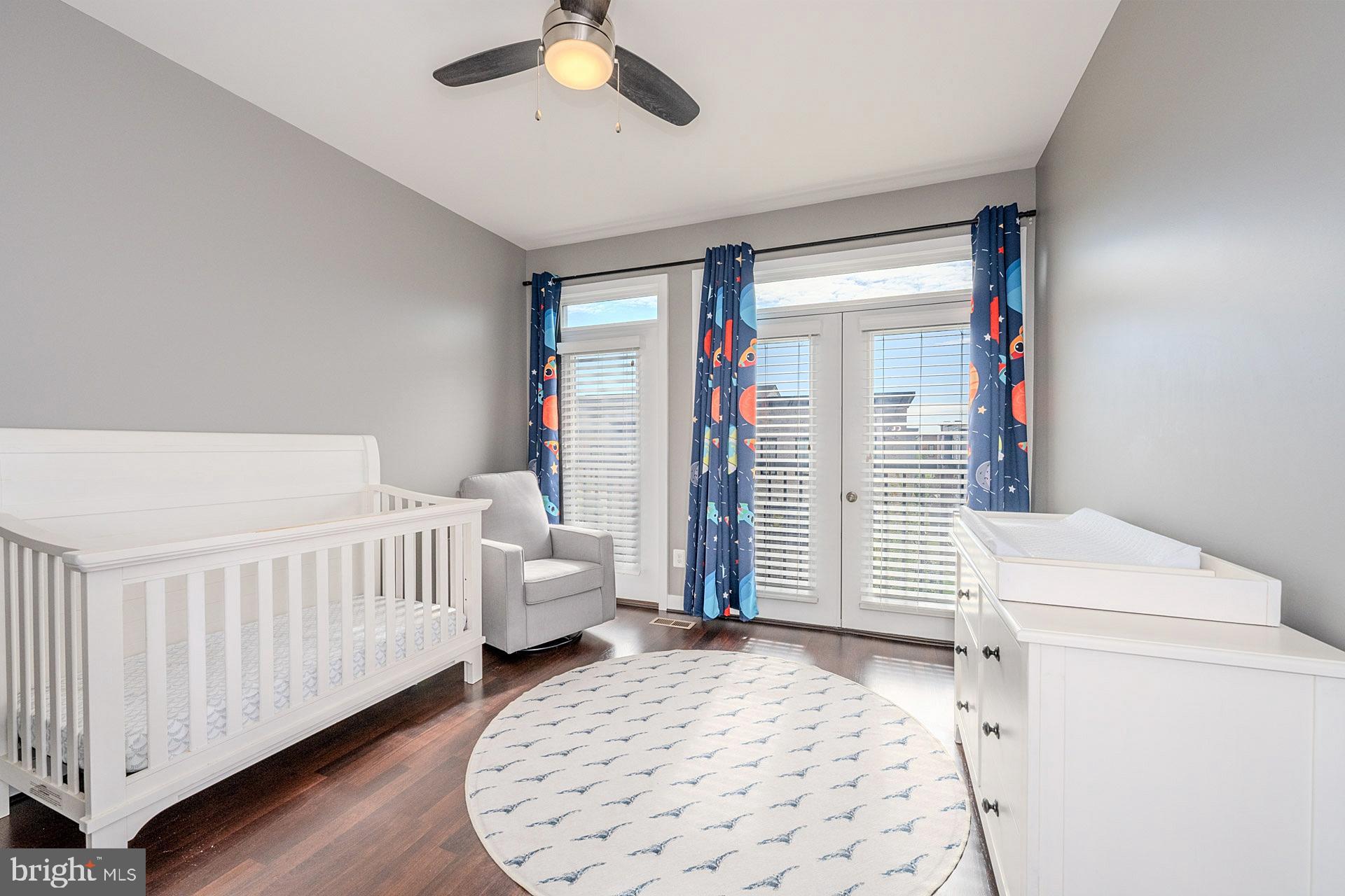 42298 Impervious Terrace Brambleton, VA 20148 - Photo 28 of 39 a bedroom with furniture and white walls