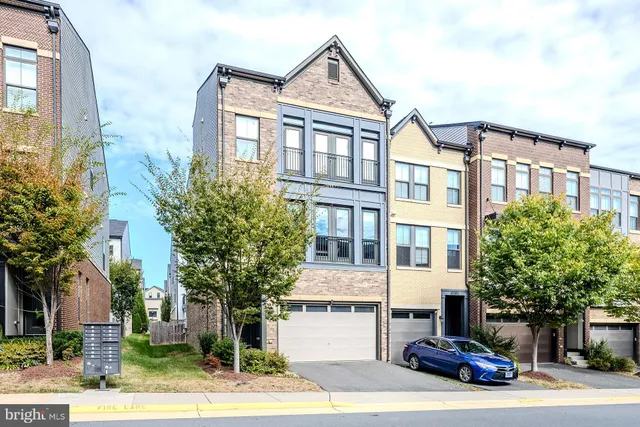 a front view of a building with street view