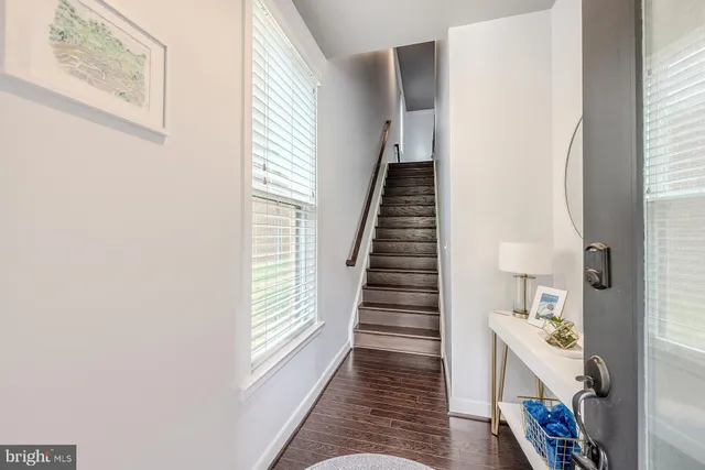 a view of a hallway with windows