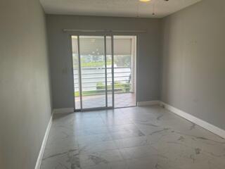 2032 Guildford East, Unit 2032B Boca Raton, FL 33434 - Photo 9 of 14 2nd Bedroom with view