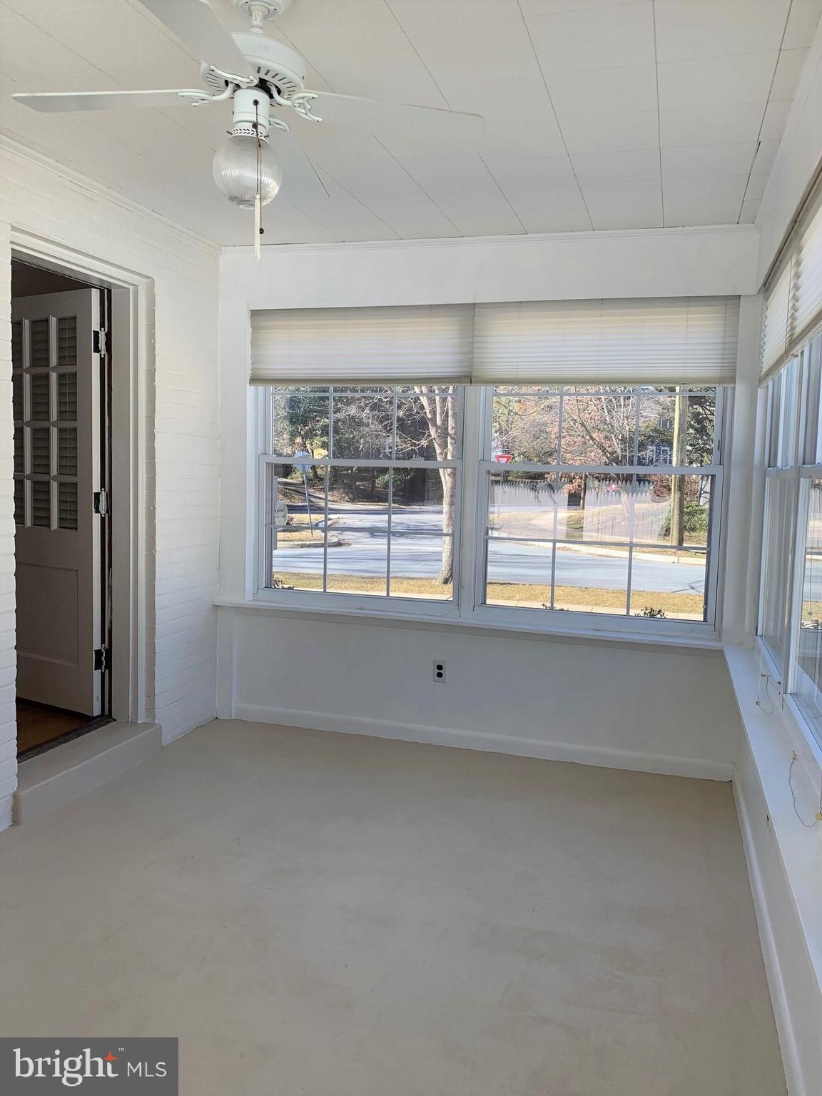 7807 Glenbrook Road Bethesda, MD 20814 - Photo 6 of 25 3-season porch off living room
