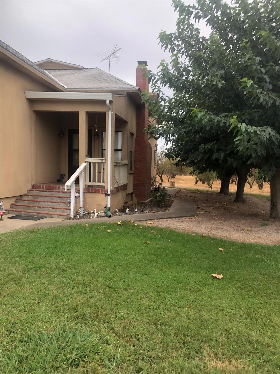 1313 South Stearns Road Oakdale, CA 95361 - Photo 12 of 57 a view of a house with backyard