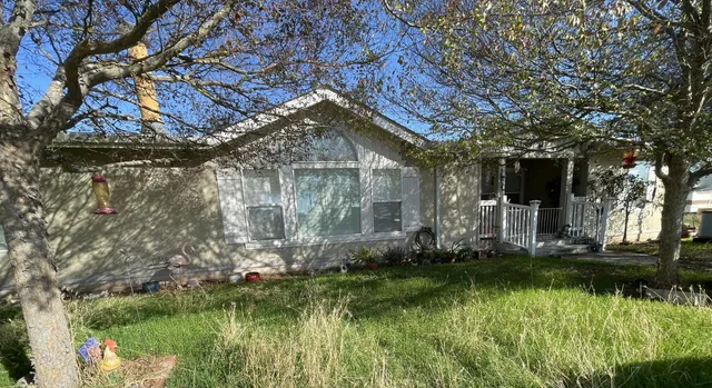 a outdoor view of a building and trees