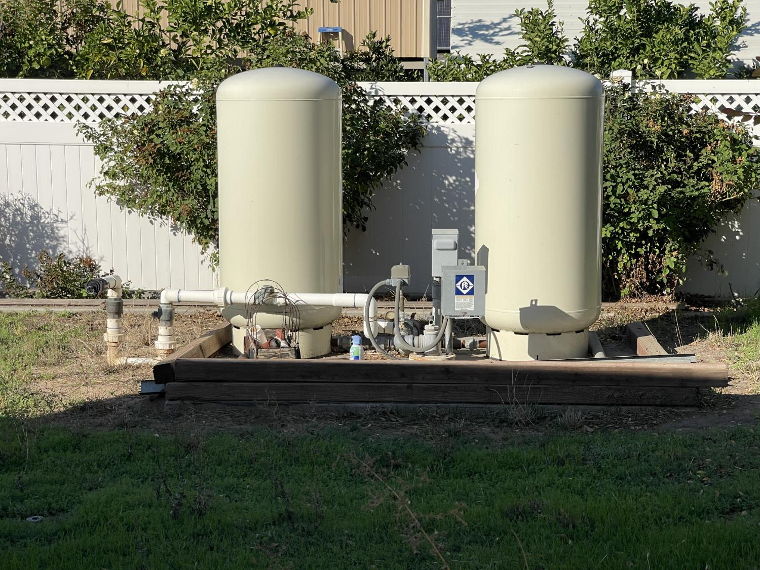 1313 South Stearns Road Oakdale, CA 95361 - Photo 53 of 57 a view of a house with a backyard and sitting area