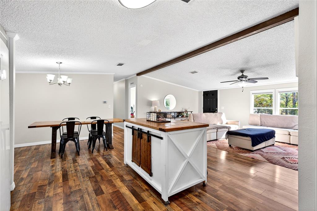 17087 Southwest 27 Street Dunnellon, FL 34432 - Photo 8 of 53 a kitchen with a stove and a table
