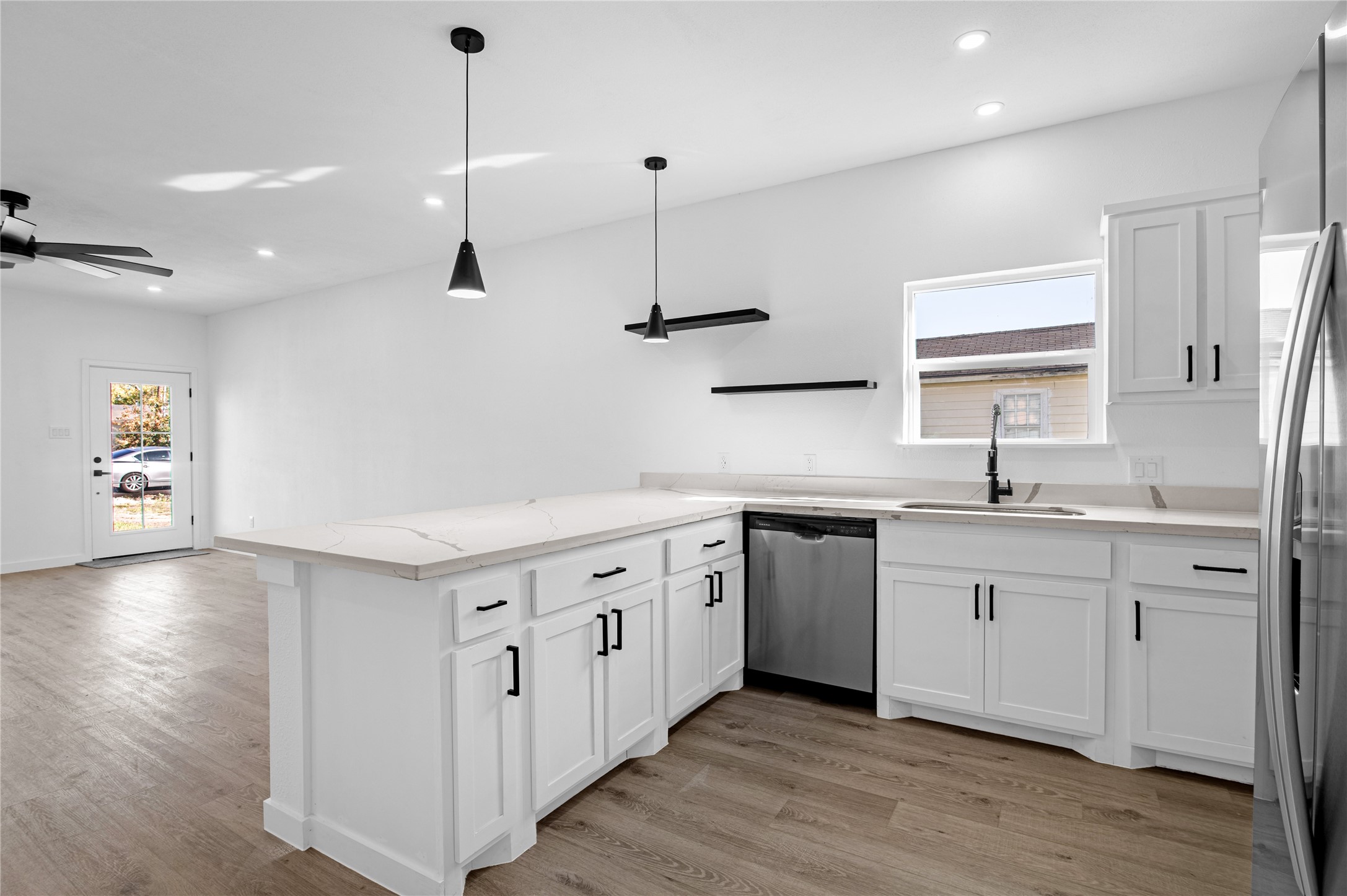 Refined modern living in a quiet, serene setting, offering a sense of privacy and understated luxury.