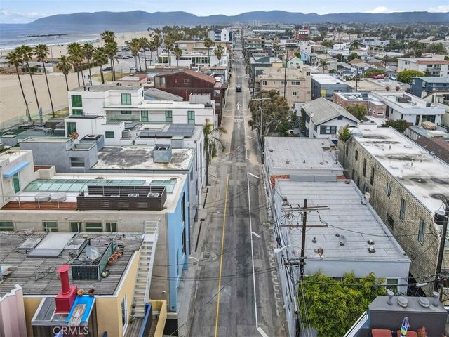 an aerial view of a city with lots of residential buildings