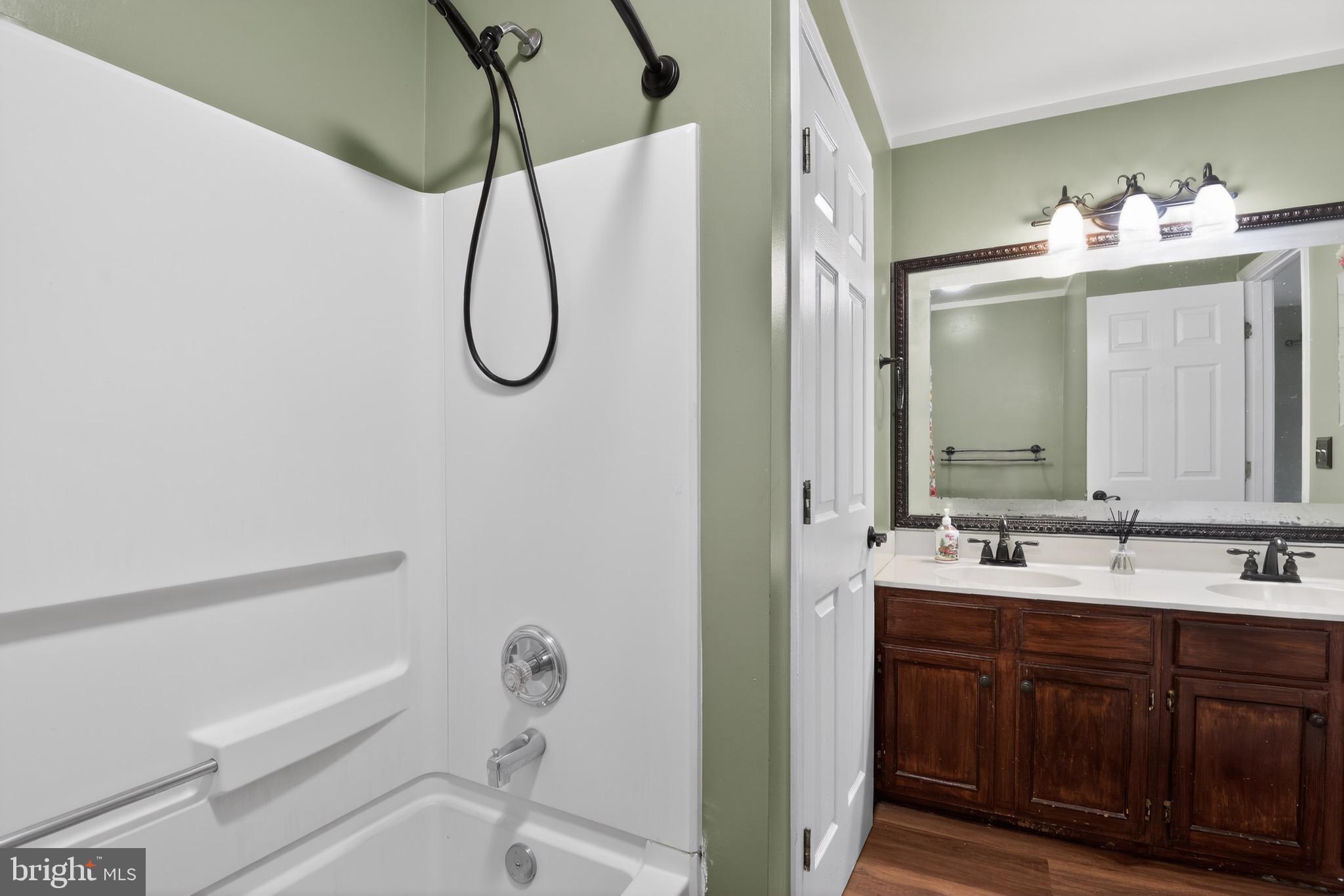 226 Finch Way Newark, DE 19702 - Photo 19 of 30 a bathroom with a sink vanity mirror and toilet