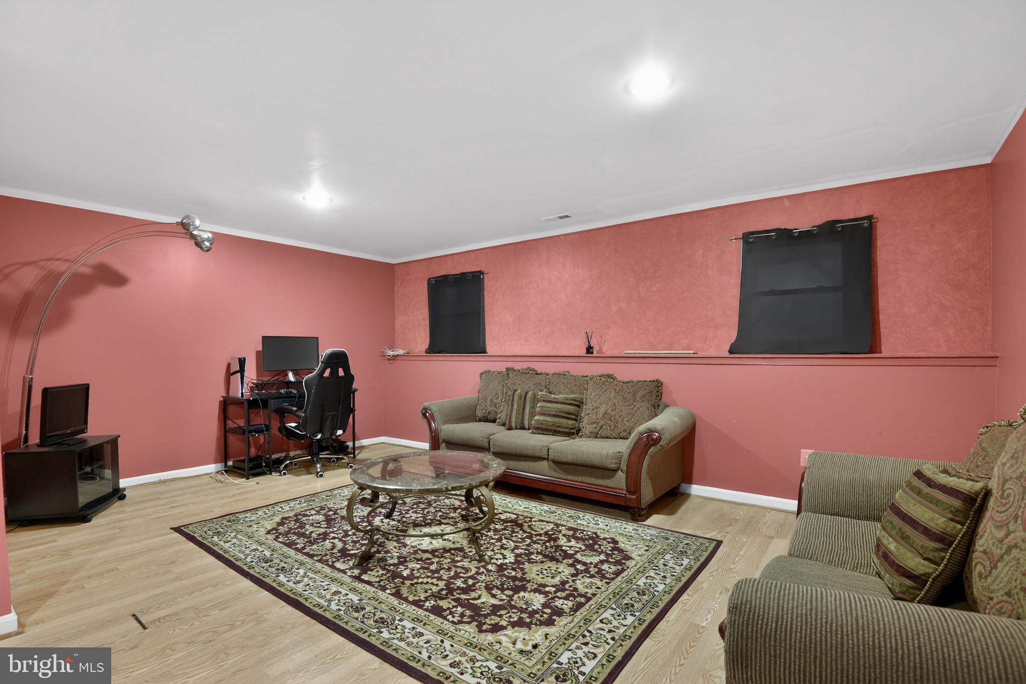 226 Finch Way Newark, DE 19702 - Photo 25 of 30 a living room with furniture and a flat screen tv