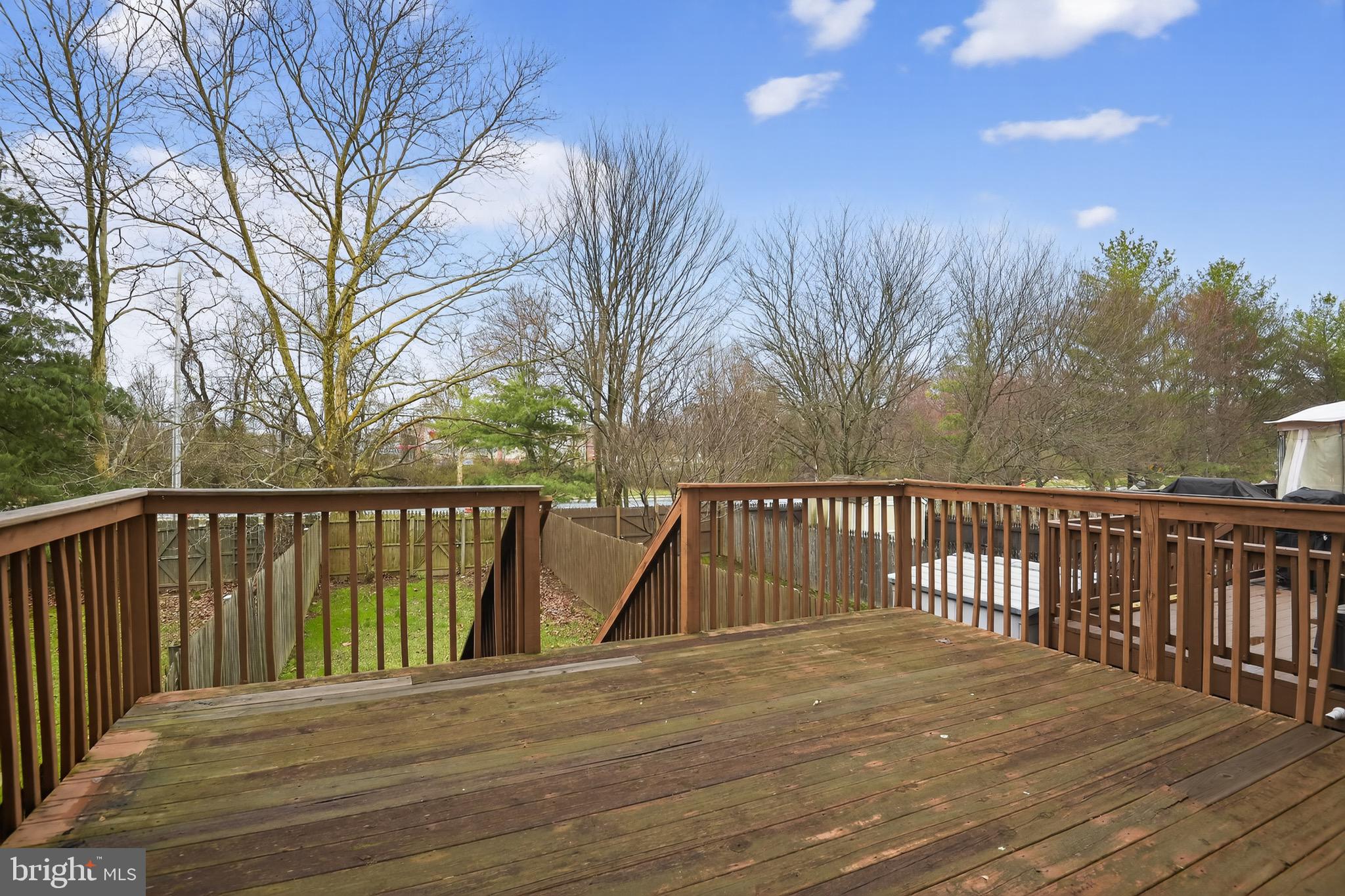 226 Finch Way Newark, DE 19702 - Photo 29 of 30 a balcony with wooden floor and fence