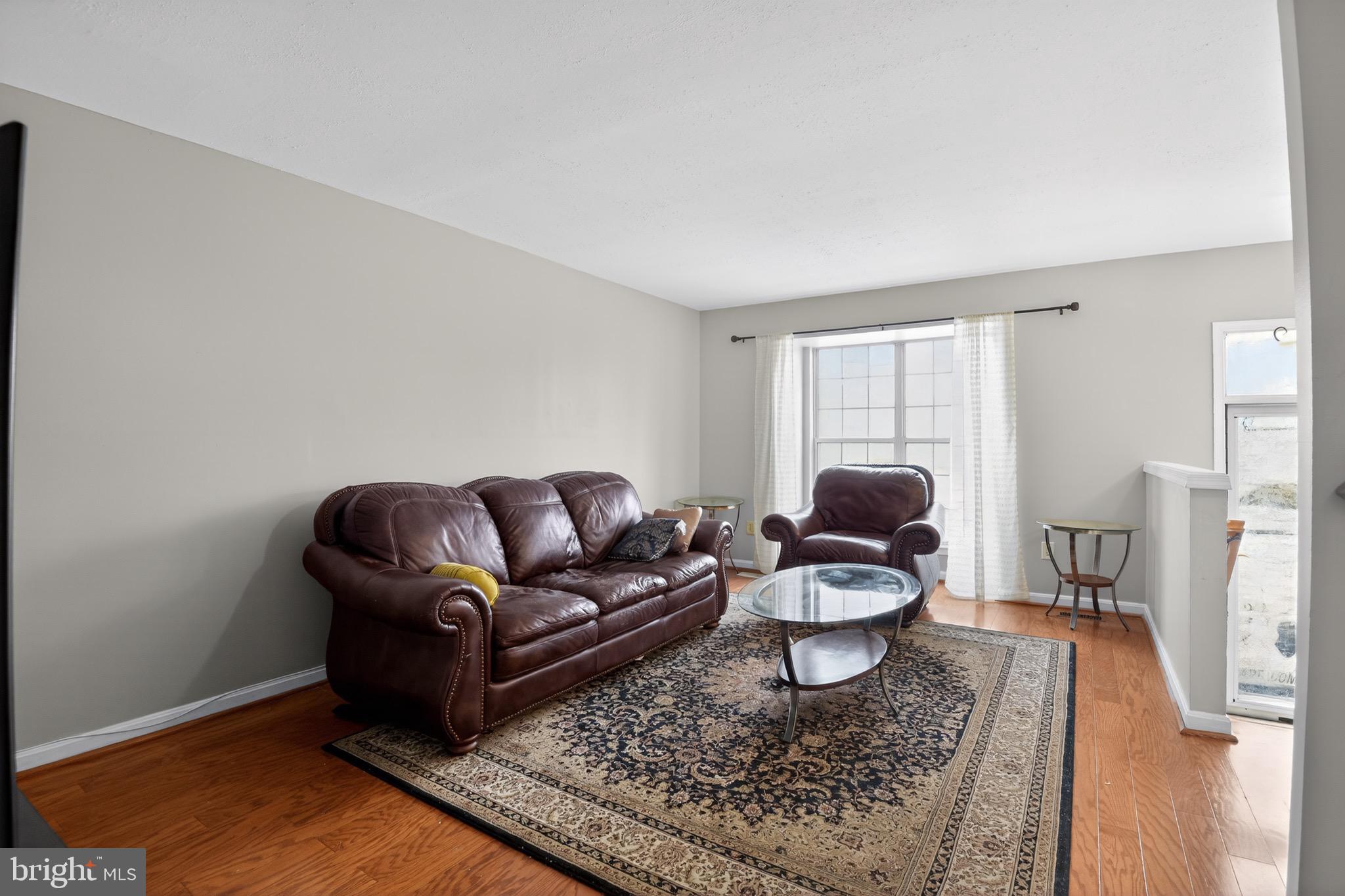 226 Finch Way Newark, DE 19702 - Photo 5 of 30 a living room with furniture and a rug