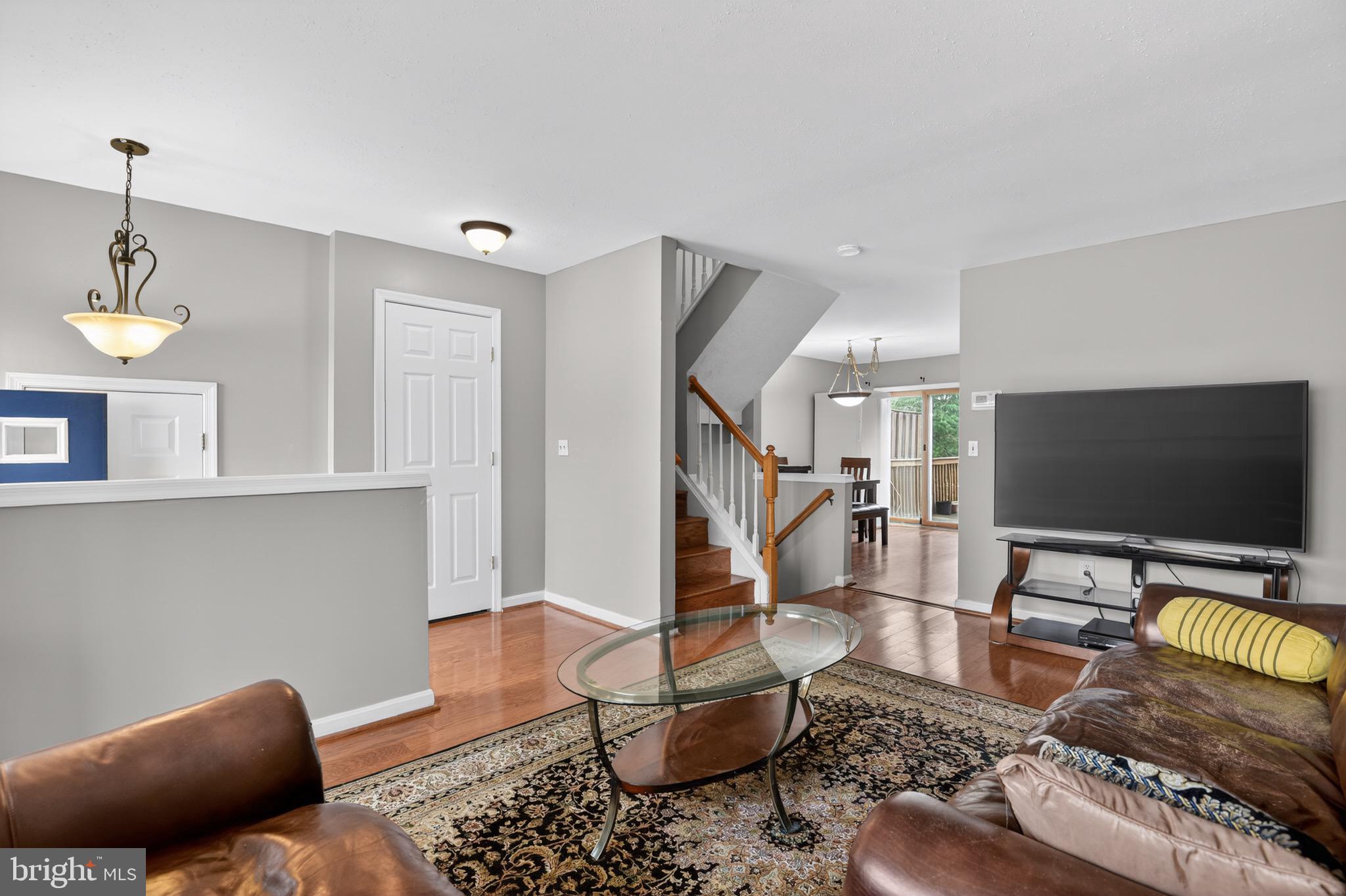 226 Finch Way Newark, DE 19702 - Photo 6 of 30 a living room with furniture and a flat screen tv