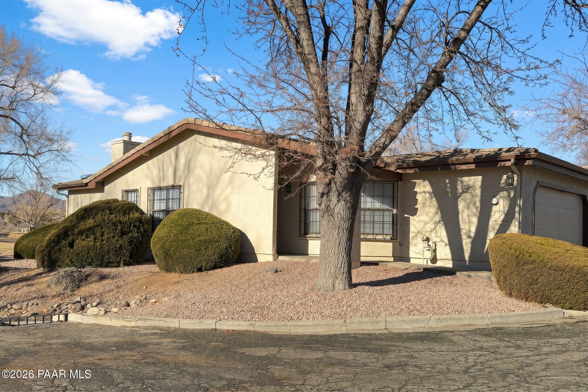 908 Rolling Green Road Dewey, AZ 86327 - Photo 13 of 13 a view of a house with a yard covered in snow