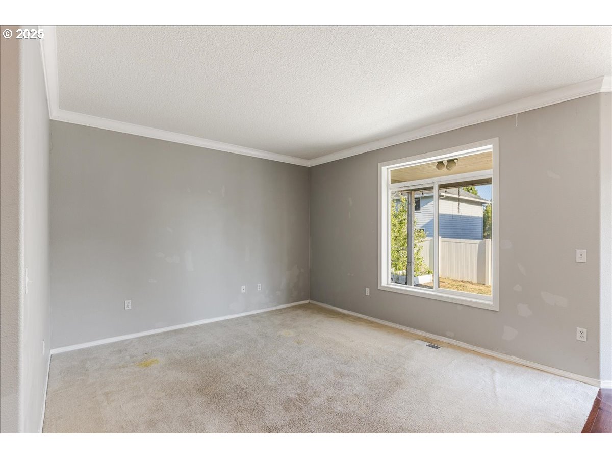 1807 North 8th Way Ridgefield, WA 98642 - Photo 16 of 44 an empty room with windows