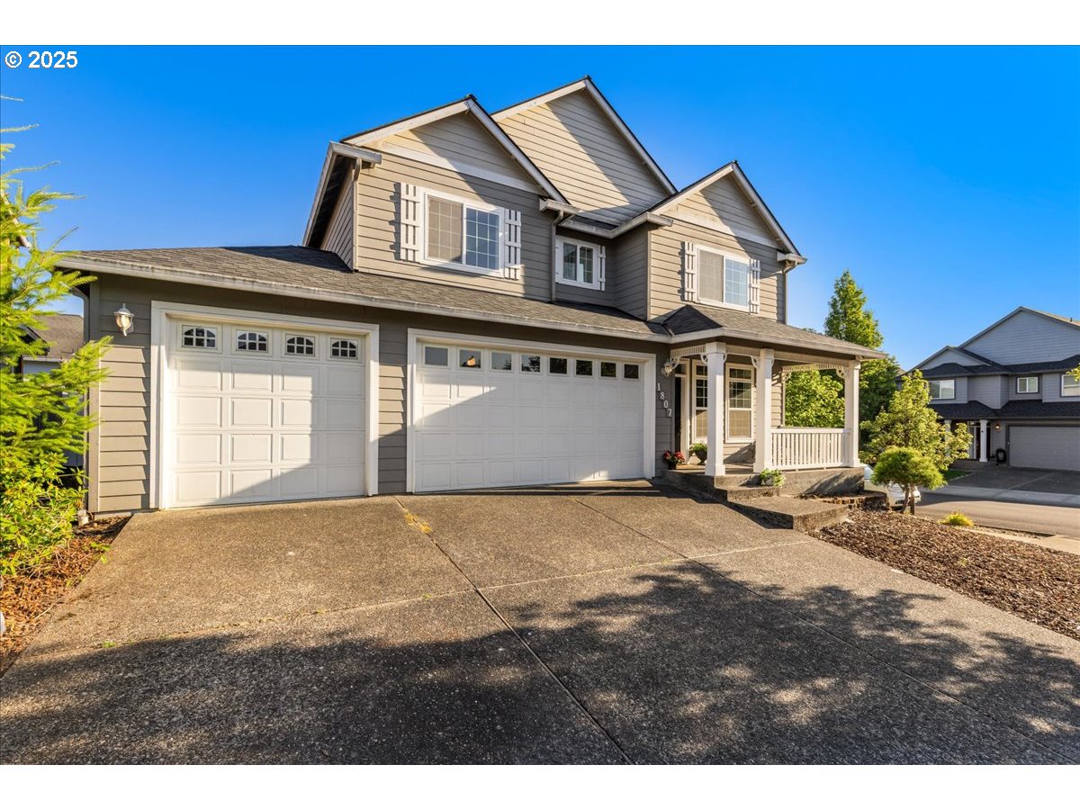 1807 North 8th Way Ridgefield, WA 98642 - Photo 2 of 44 a view of a house with a outdoor space
