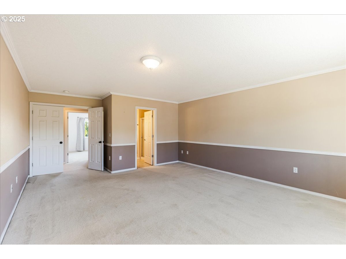 1807 North 8th Way Ridgefield, WA 98642 - Photo 21 of 44 a view of an empty room with window