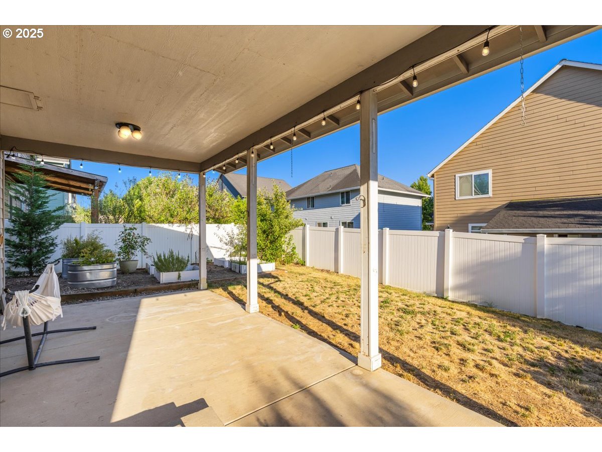 1807 North 8th Way Ridgefield, WA 98642 - Photo 33 of 44 a view of a patio with table and chairs