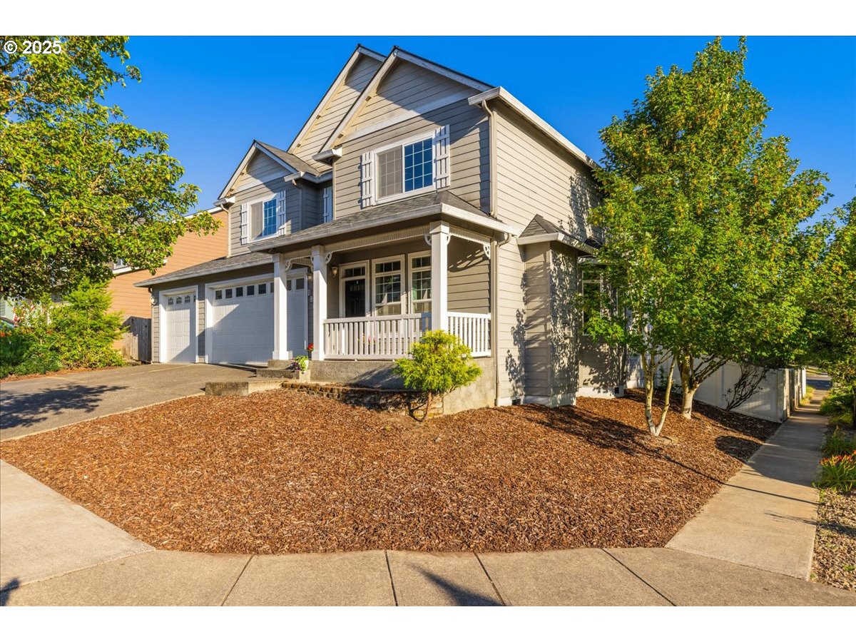 1807 North 8th Way Ridgefield, WA 98642 - Photo 44 of 44 a view of a yard in front of a house