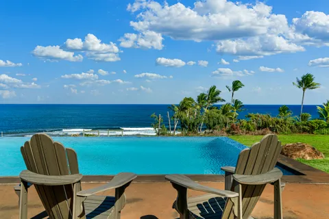a room with gym equipment and a view of living room