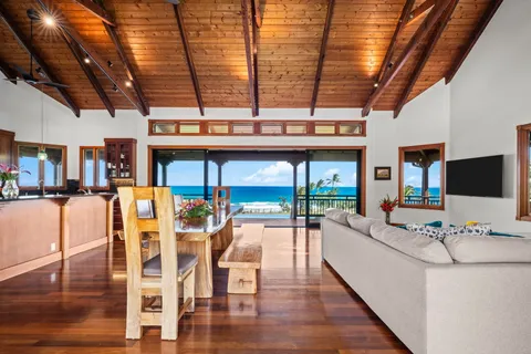 a view of a backyard with plants and a yard