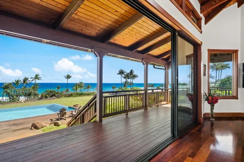a kitchen view of a stove and wooden floor