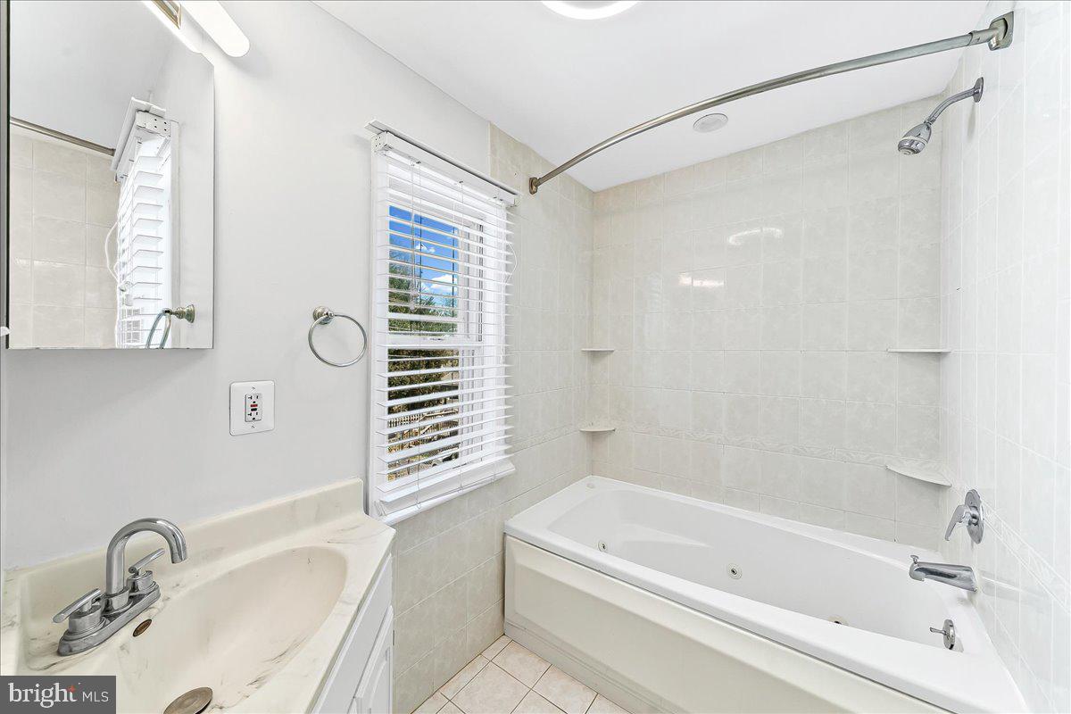 755 Braxton Road Ridley Park, PA 19078 - Photo 15 of 27 Serene bathroom with natural light.