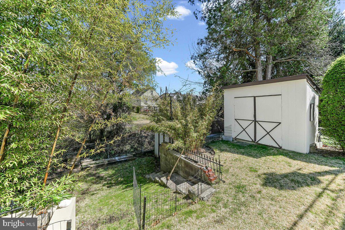 755 Braxton Road Ridley Park, PA 19078 - Photo 26 of 27 Serene backyard retreat with shed.