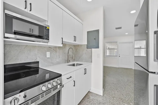 an empty room with windows