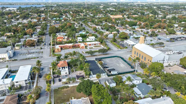 an aerial view of a house with a garden