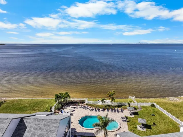 a view of a swimming pool and outdoor space