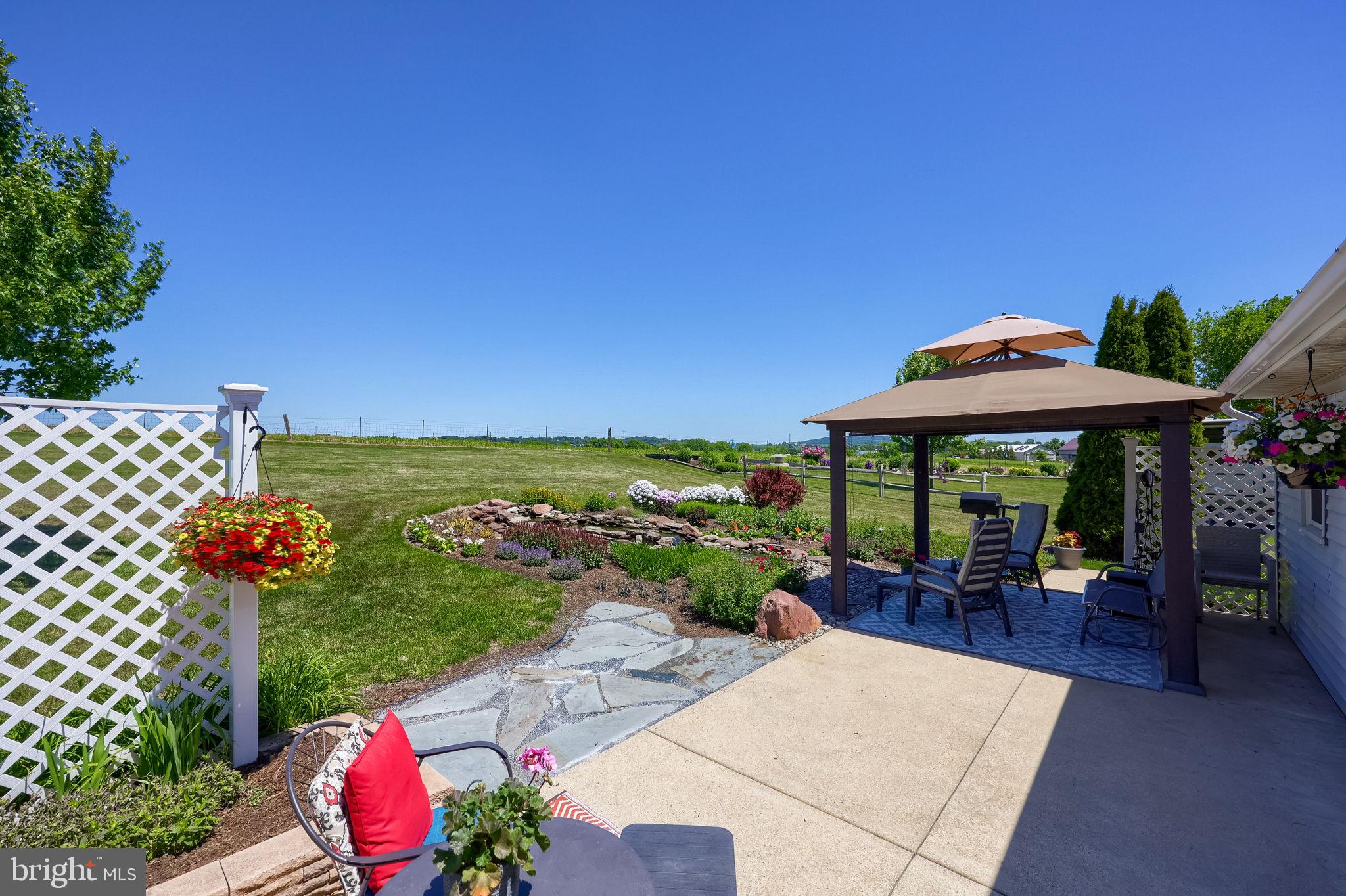 91 Buchland Road Ephrata, PA 17522 - Photo 50 of 59 Serene patio with lush garden views.