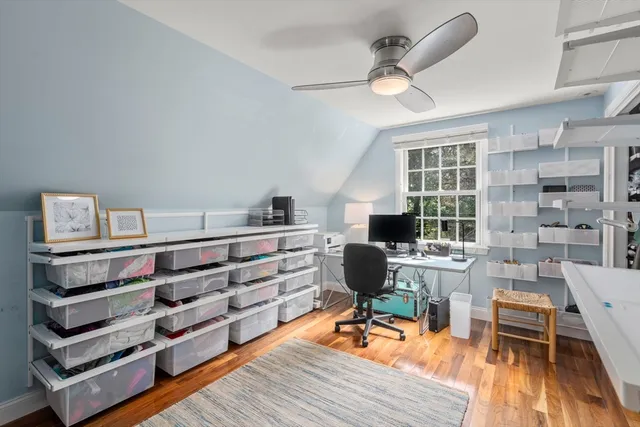 a workspace with wooden floor