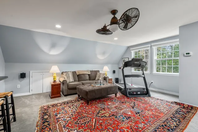 a bedroom with bed and window