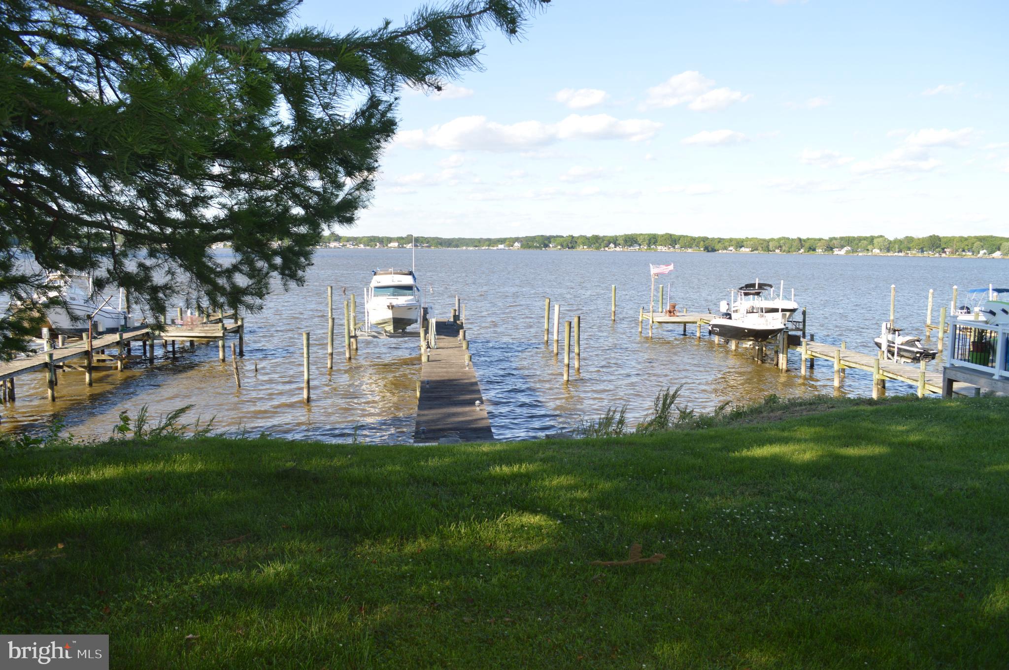 4218 Lynhurst Road Baltimore, MD 21222 - Photo 26 of 27 view to pier from sunroom