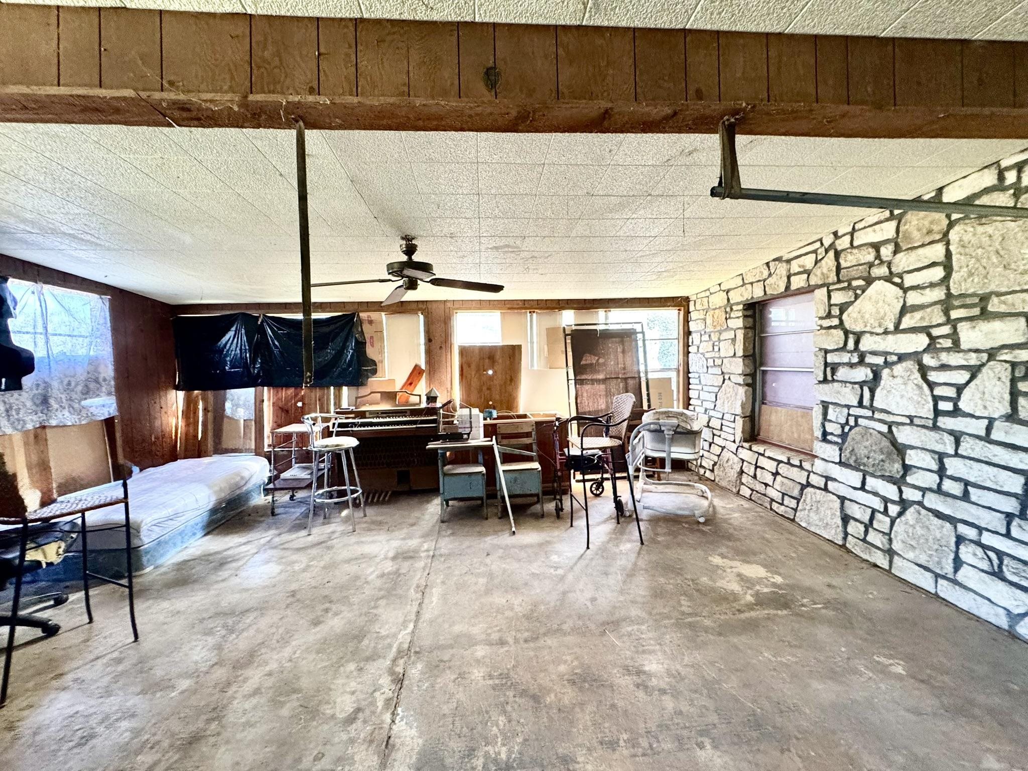 520 Munson Tow, TX 78672 - Photo 12 of 24 a living room with lots of furniture and white walls