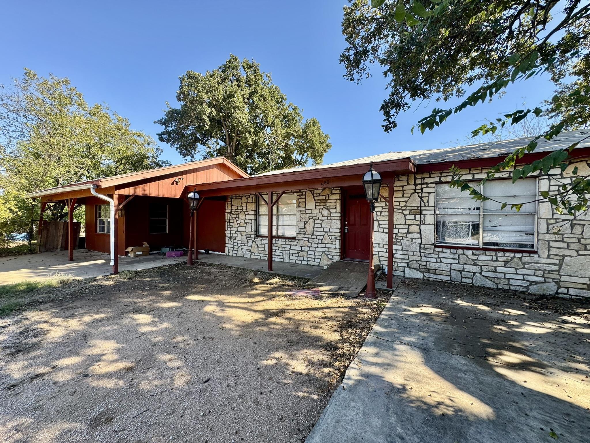 520 Munson Tow, TX 78672 - Photo 21 of 24 a view of a house with a yard