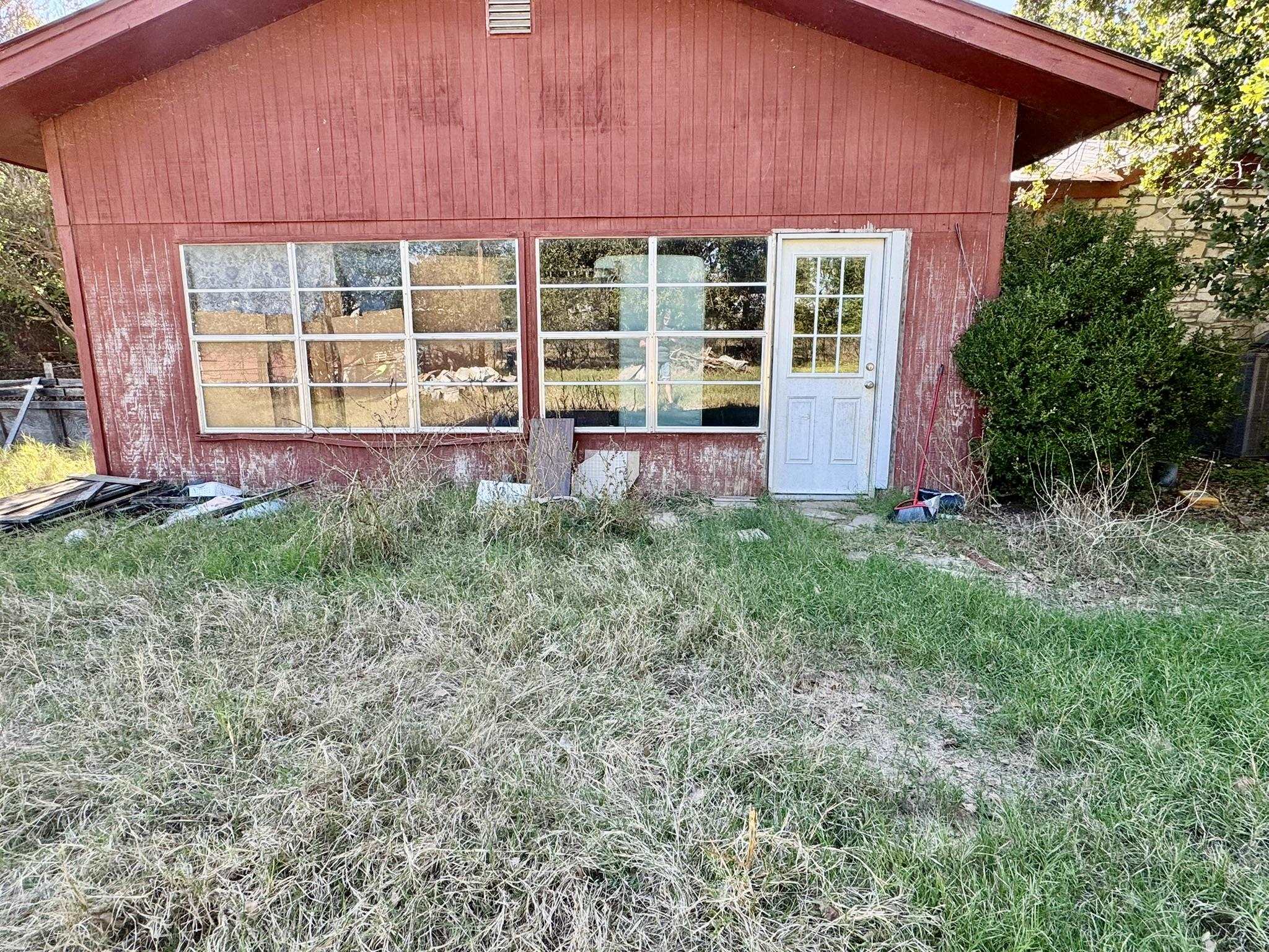 520 Munson Tow, TX 78672 - Photo 22 of 24 front view of a house with a yard
