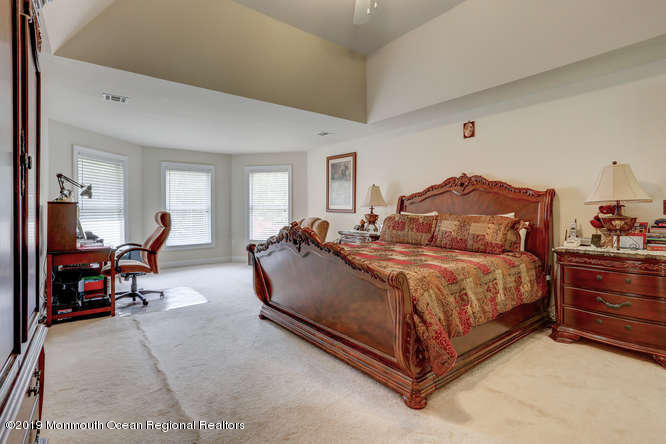 58 Fort Plains Road Howell, NJ 07731 - Photo 16 of 33 a bed room with a bed and chair