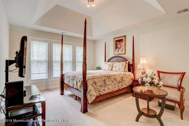 58 Fort Plains Road Howell, NJ 07731 - Photo 21 of 33 a bedroom with a bed and a window