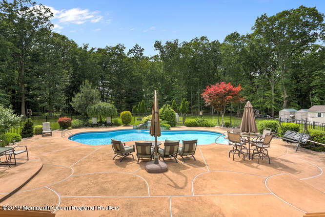 58 Fort Plains Road Howell, NJ 07731 - Photo 28 of 33 a view of a swimming pool with sitting area