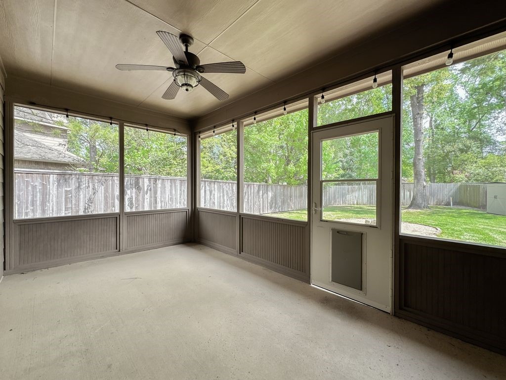 10 Pilot Rock Place Tomball, TX 77375 - Photo 26 of 38 a view of an empty room with a large window
