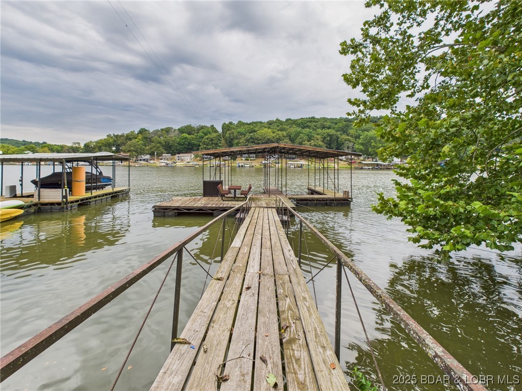 28468 Possum Trot Road Stover, MO 65078 - Photo 16 of 28 Table and swim area