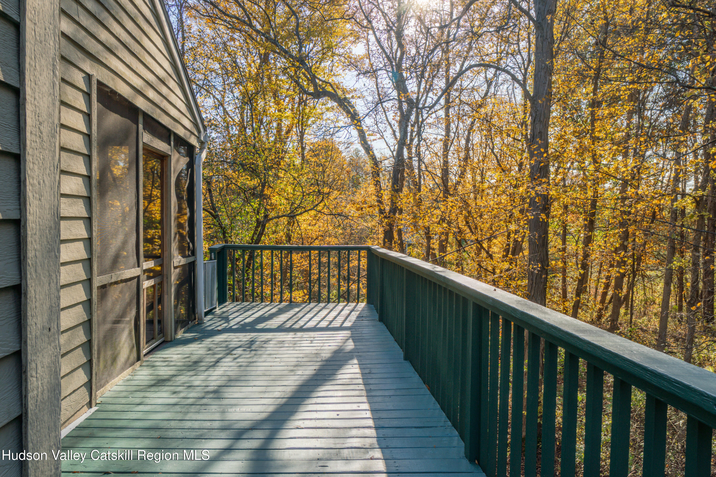 12 Glow Court Athens, NY 12015 - Photo 18 of 22 a balcony with an outdoor space
