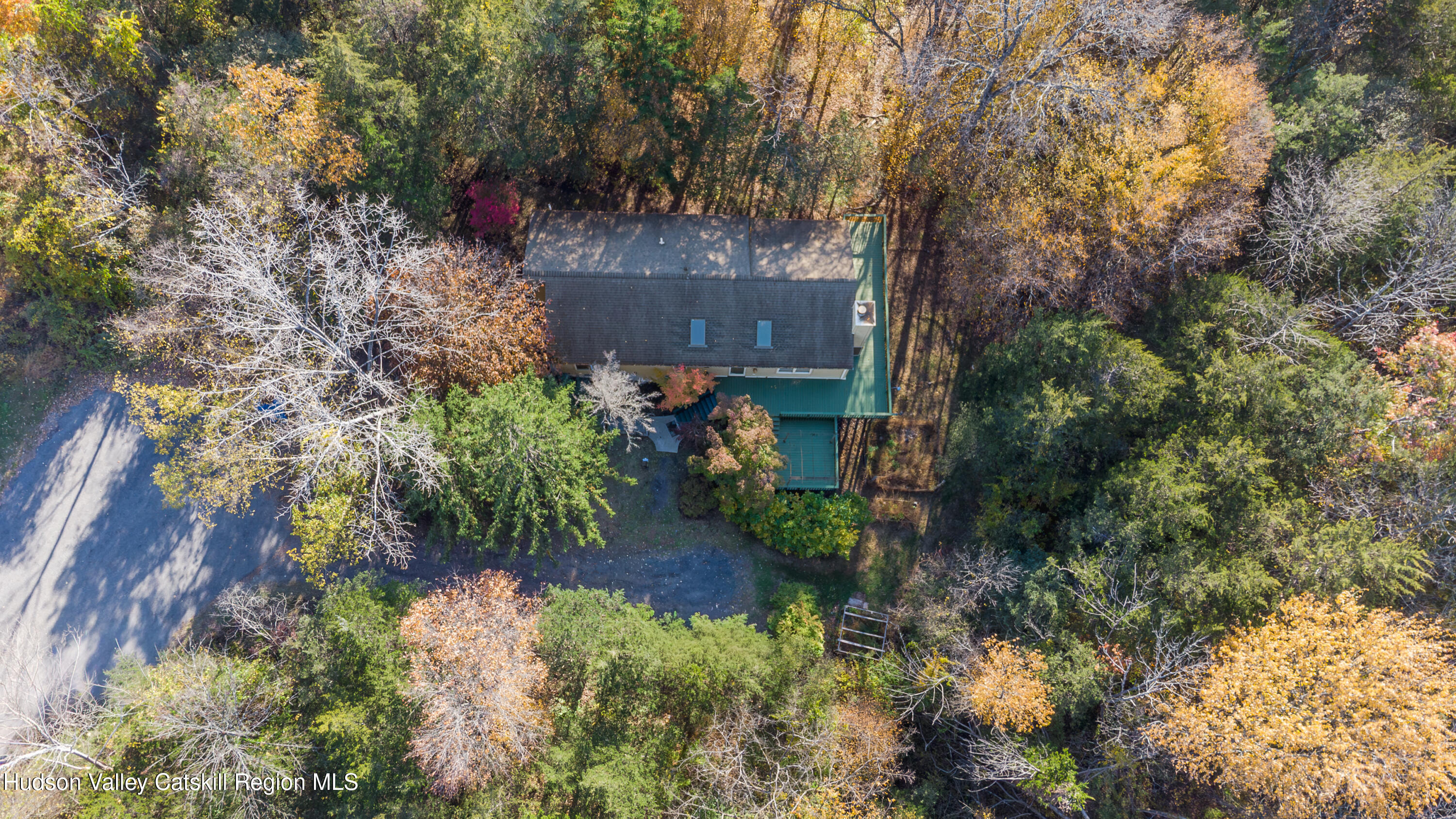 12 Glow Court Athens, NY 12015 - Photo 21 of 22 a backyard of a house with a yard and outdoor seating