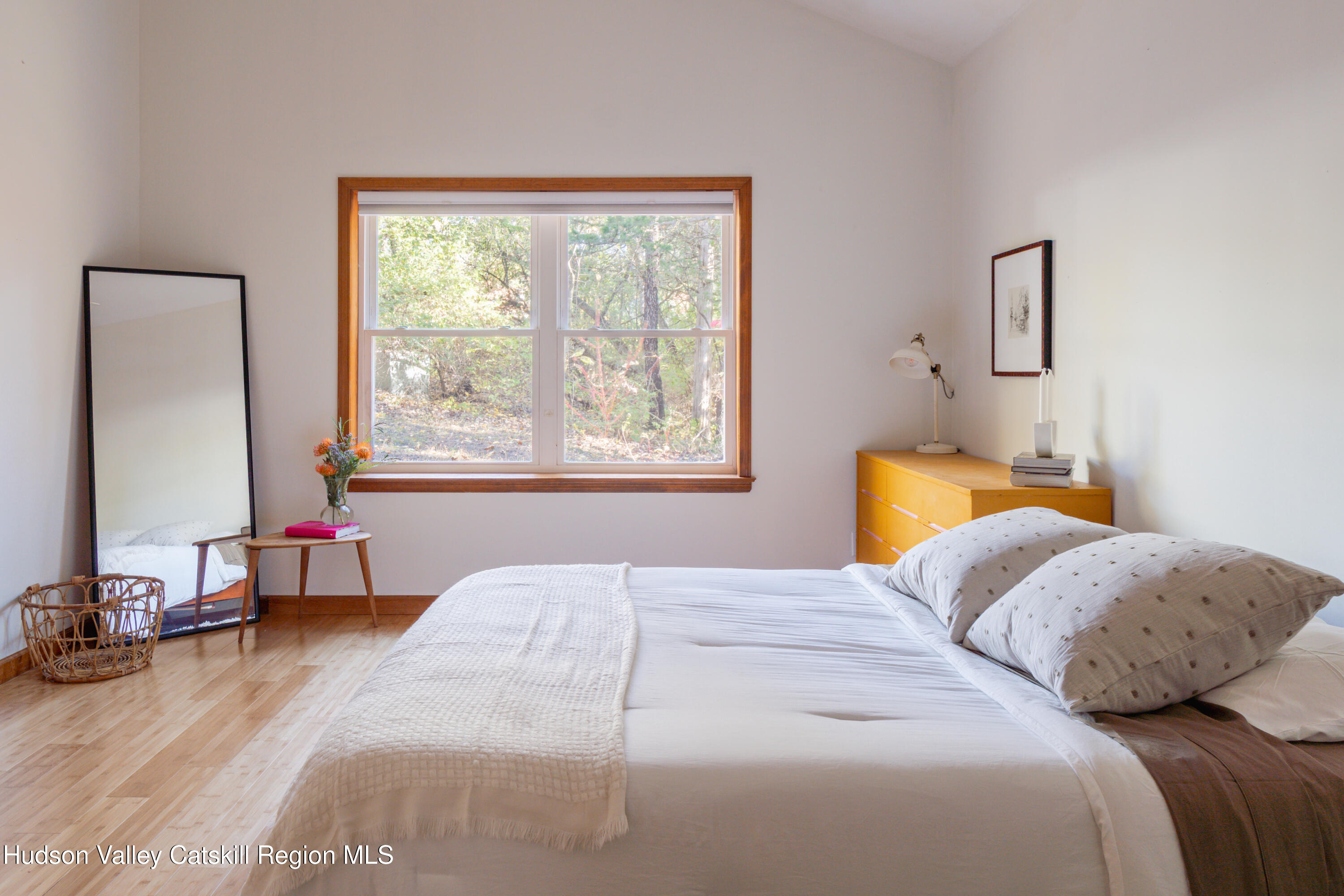 12 Glow Court Athens, NY 12015 - Photo 9 of 22 a bedroom with a bed and a window